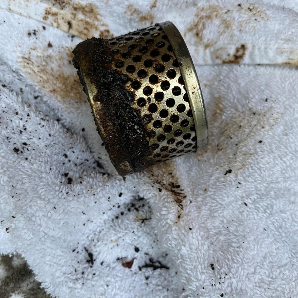 Oil boiler servicing mesh filter detail